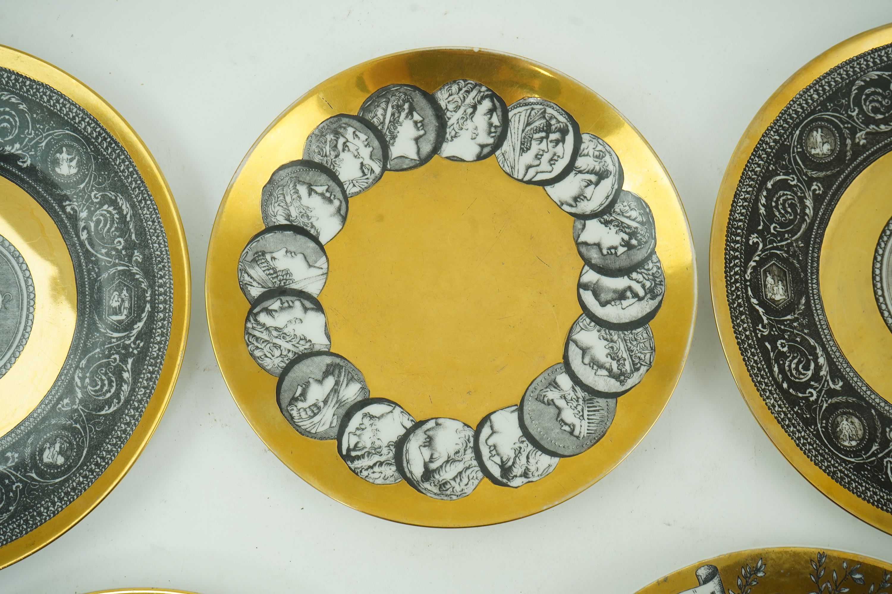 Piero Fornasetti (Italian, 1913-1988): Five various plates